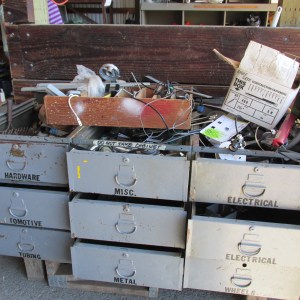 SOMEBODY will find a use for this stuff. But you can't have the cabinet.