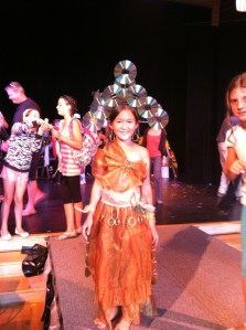 Isn't she ADORABLE? Those are CDs on her head. She could belly-dance, too. Definitely a prize-winner.