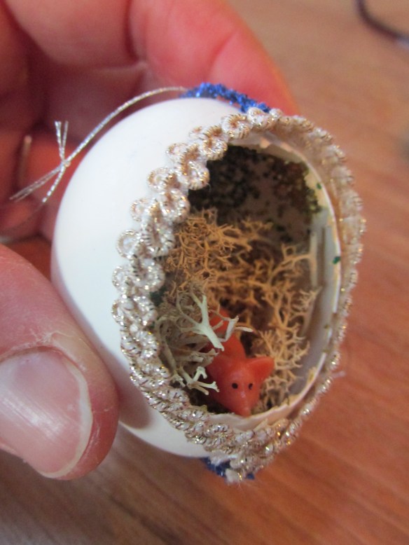 Try positioning your creature to peep out of the egg!